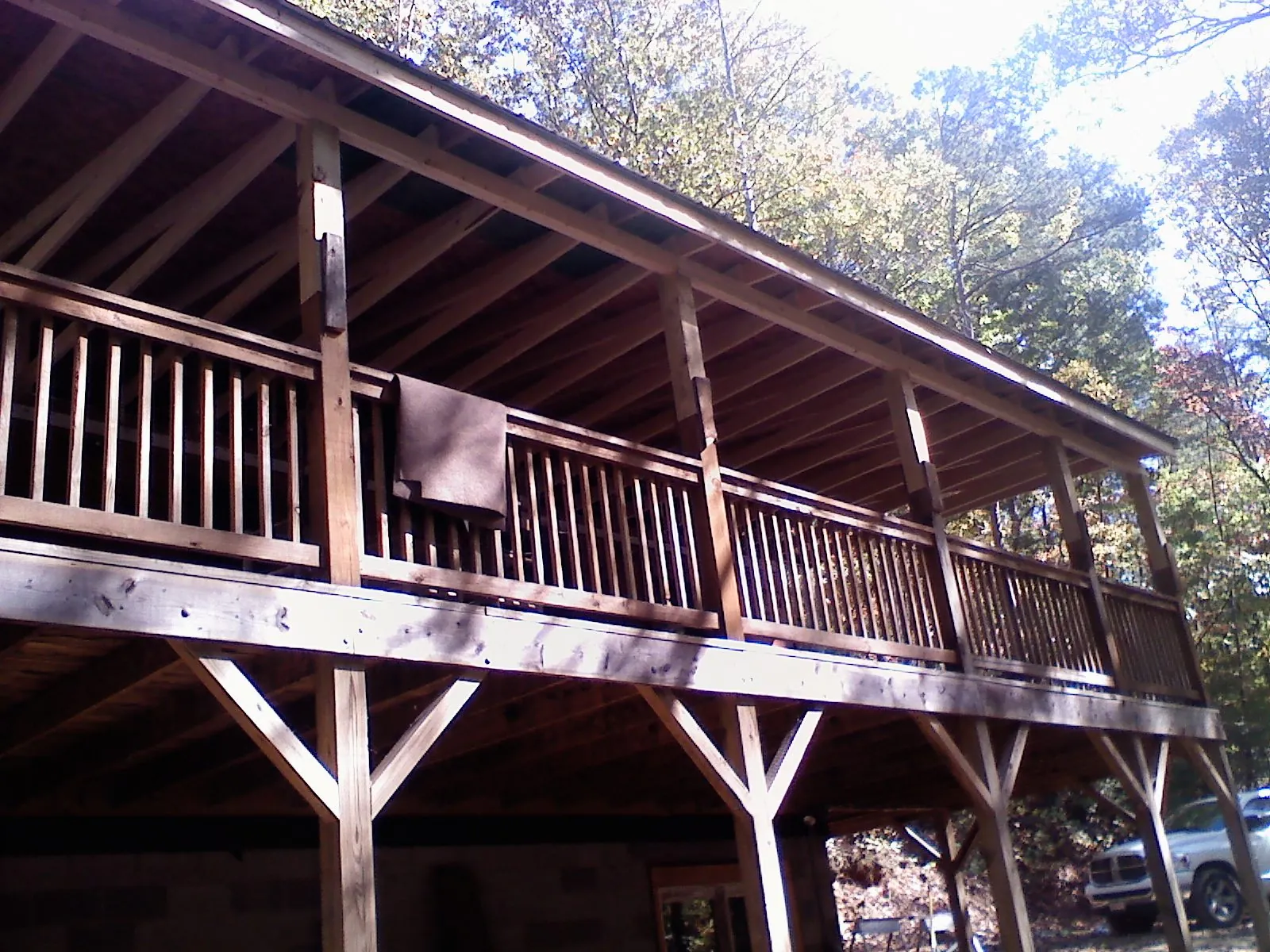 Timber framing under a new elevated porch and deck — Roof Leak Repair in Gilberts by Roofing Brothers